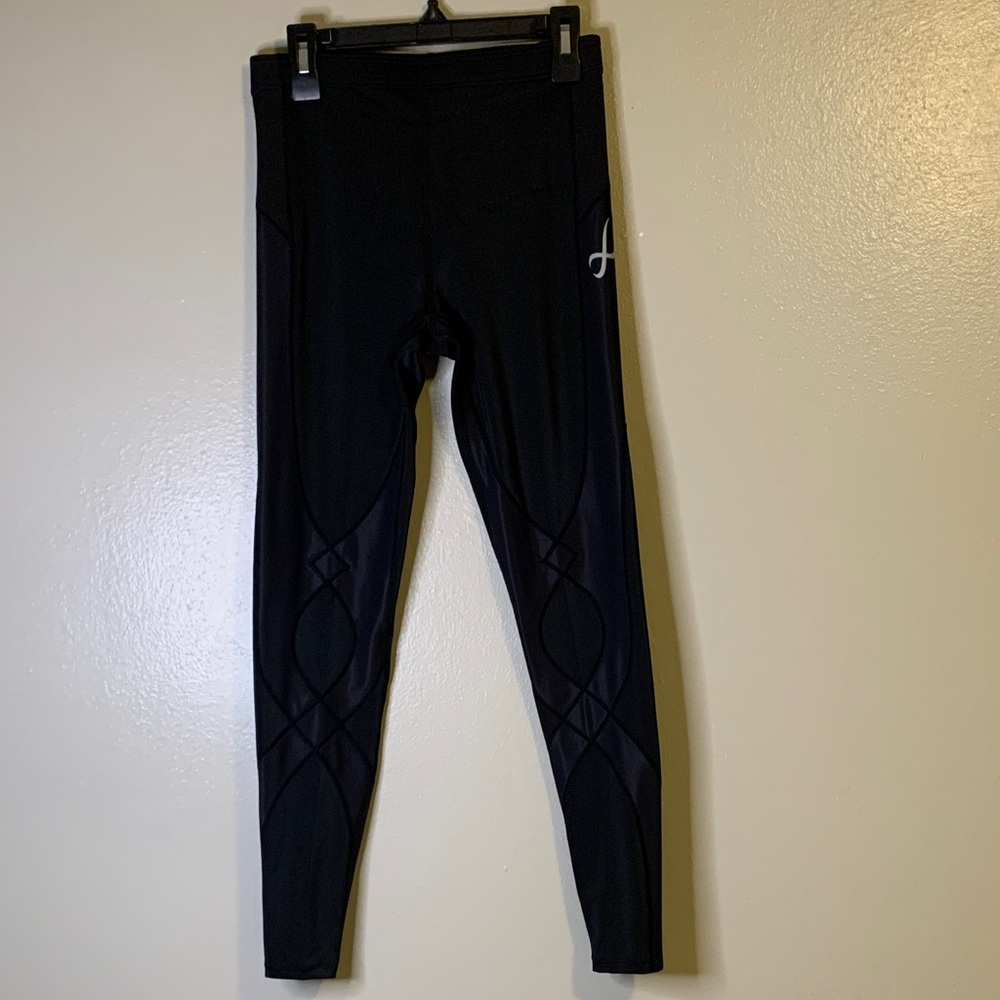 CW-X Stabilyx Joint Support Compression Tights for men.